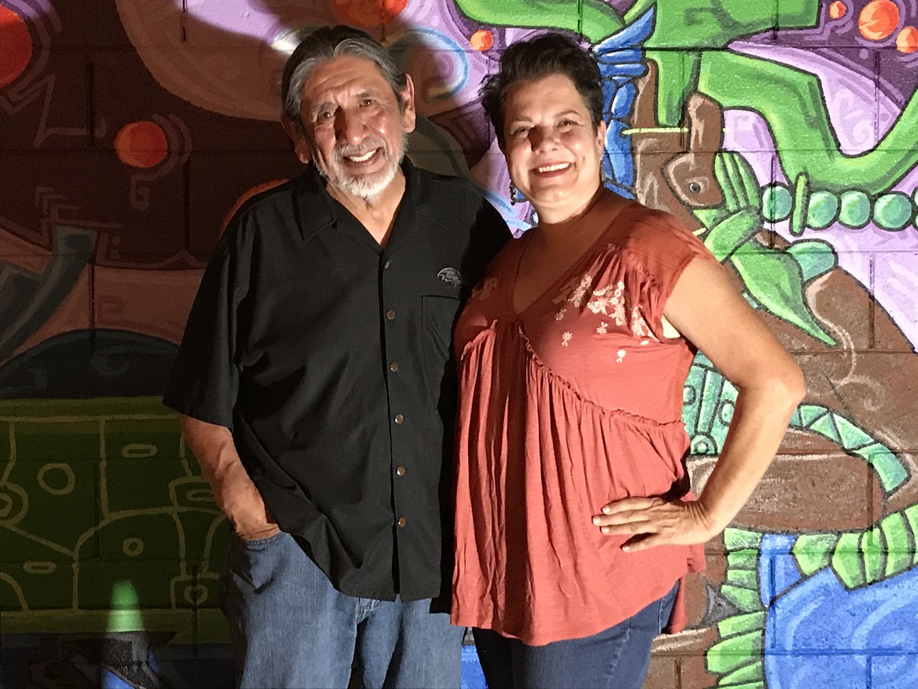 Martin Moreno and Emily Costello (pictured with a mural by Edgar Fernandez) will work together on creating light rail art.