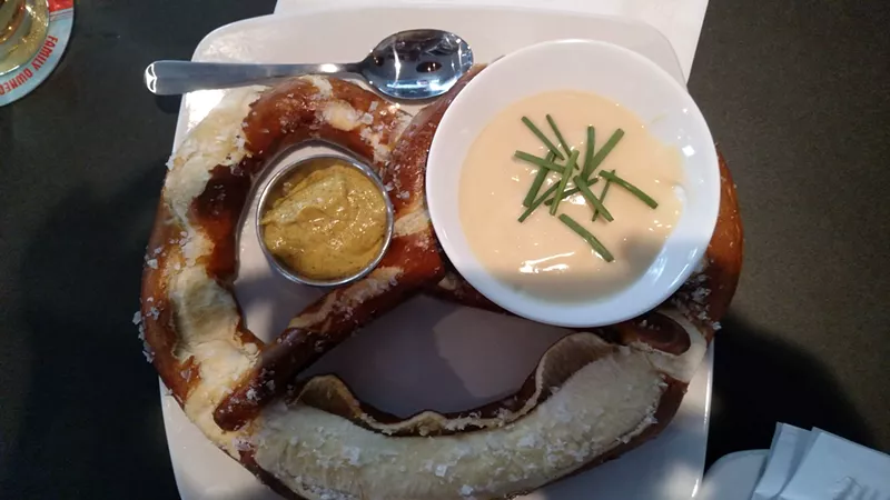 Image: The Bavarian pretzel is a great option to enjoy alongside your beer sampler at Huss Brewing's Taproom in Uptown Plaza.