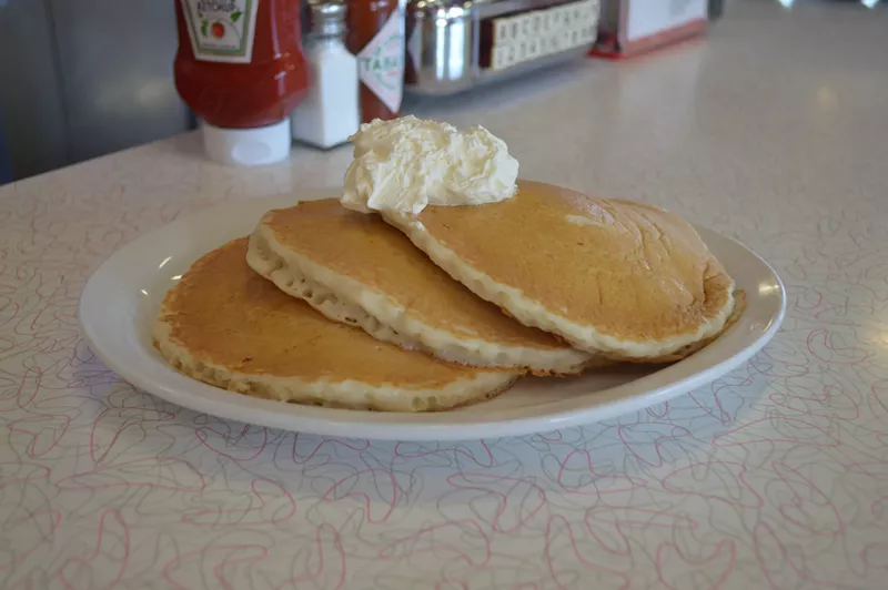 Image: A straight-up stack of classic pancakes at Chase's Diner.