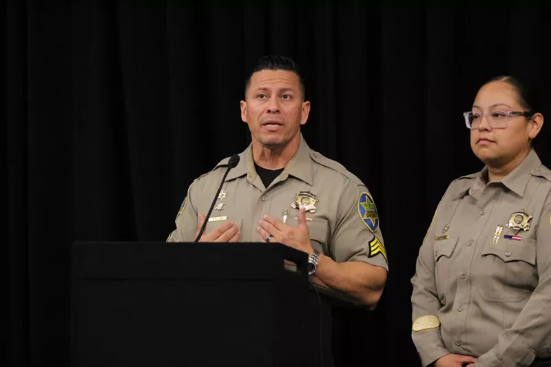 Image: two sheriff's office employees in uniform