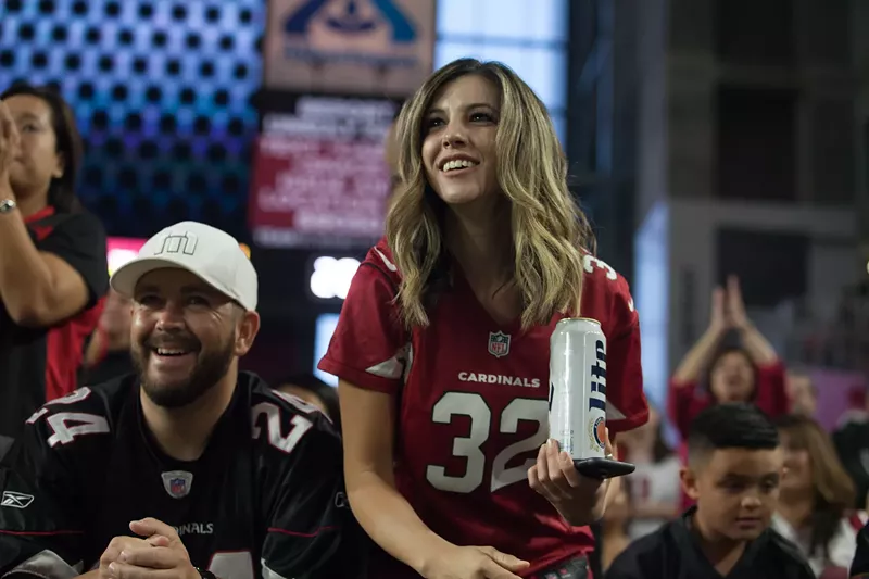 Image: Fans at a 2016 Arizona Cardinals game.