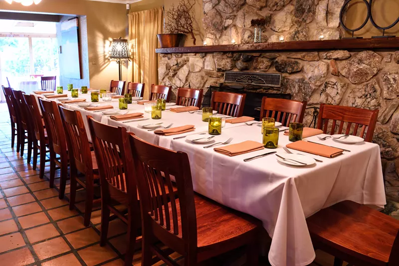 Image: The Quiessence Fireplace Room is the perfect cozy spot for a holiday gathering.