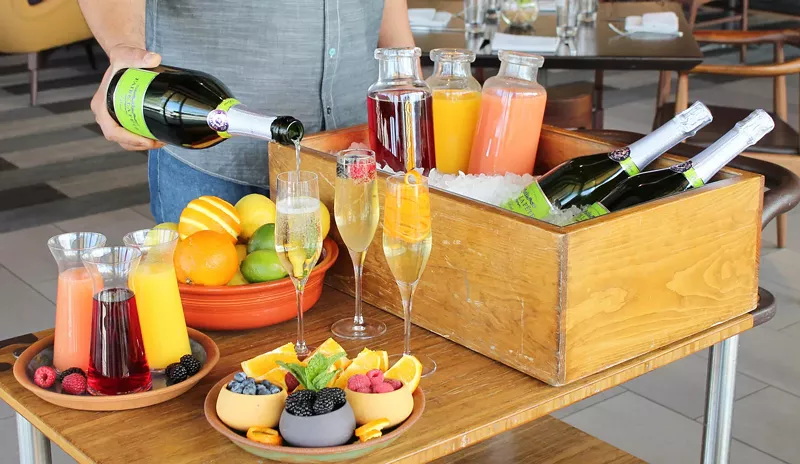 Image: Bottomless mimosas at Weft & Warp Art Bar + Kitchen will help you celebrate the holiday.