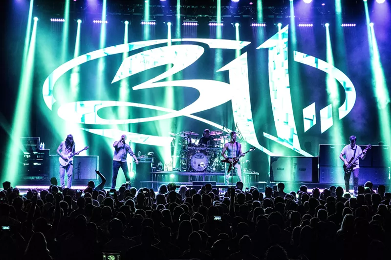 Image: 311 in concert in 2019.