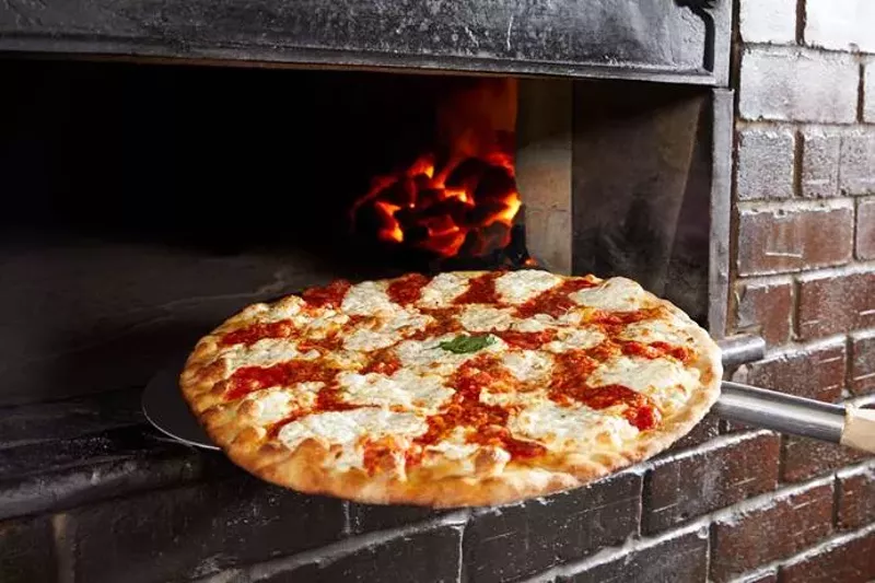Image: Round pizza for a round world.