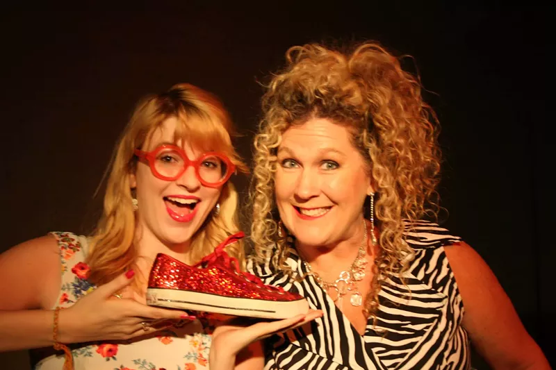 Image: Hattie Hayes and Kristie Lindeman have a shoe for you in Remote Control.