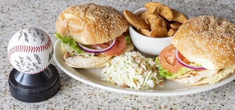 Image: During spring training, get two chicken sandwiches for the price of one with the purchase of two drinks.