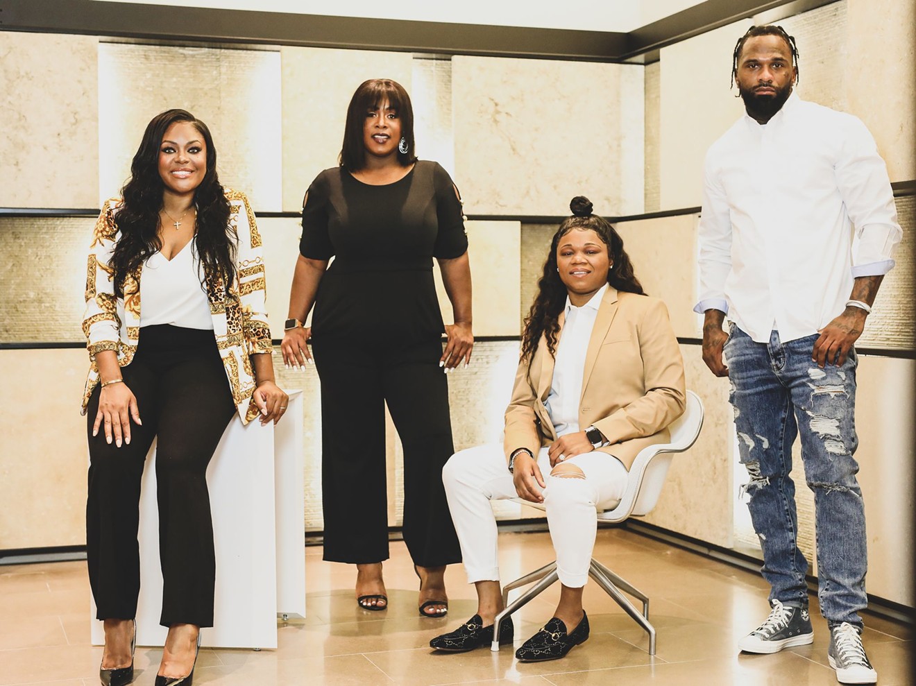 The AXIS crew, left to right: Dominique Simpson, publicist; Mechelle Tucker, co-founder; Ja-nice Johnson, CEO; and Brandon Wells, partner.
