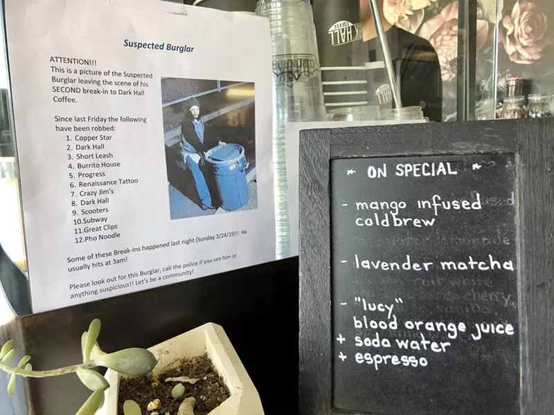 Image: Surveillance screenshot on display at Dark Hall Coffee.