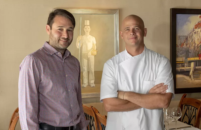 Image: Atlas Bistro part-owner Todd Sawyer and Chef Cory Oppold. Oppold has recently launched Simmer Down, an at-home gourmet dining experience.