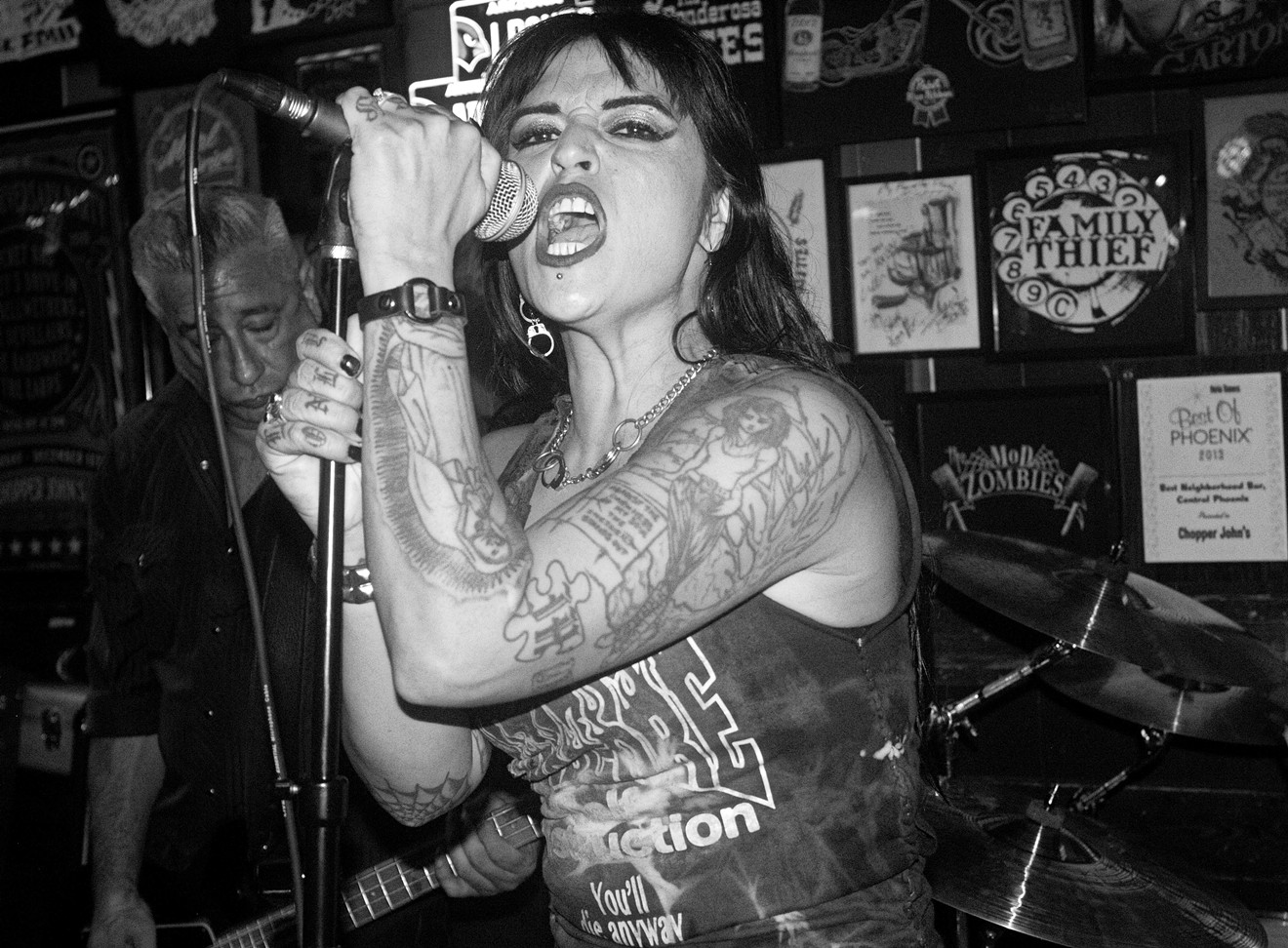 The late Sarah Shelton of The Brand with bassist Danny Bravo in the background at Chopper John's in Phoenix.