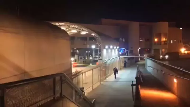 Image: In this screenshot of a KOLD-TV video taken the night of the shooting, police lights can be seen where the pickup Mendivil Perez was in came to rest after a U.S. border officer shot him in the head.