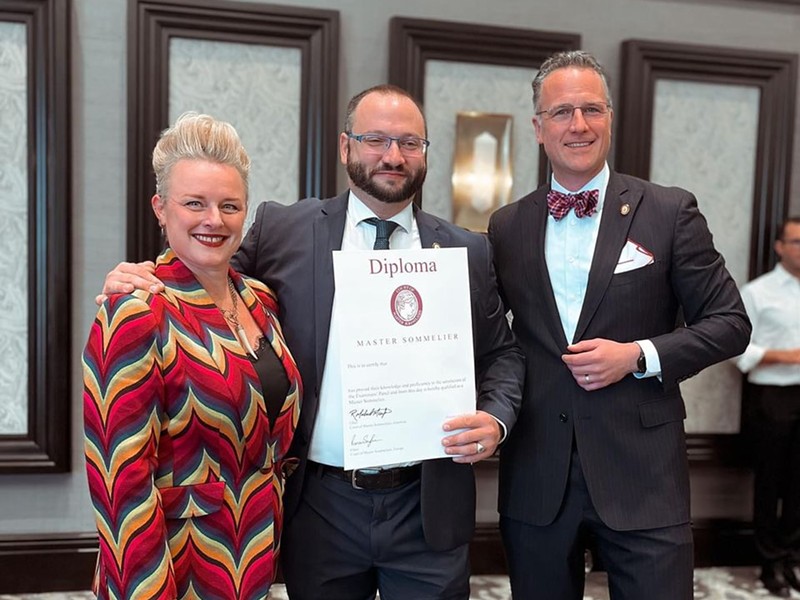 Mark Guillaudeu (center) became a Master Sommelier in 2023. He received his diploma from Master Sommeliers Emily Wines (left) and Michael Meagher (right).