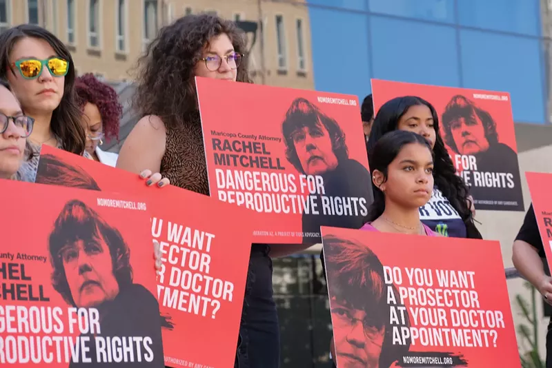 Image: Activists gathered at the steps of the Maricopa County Attorney's Office on Wednesday to criticize County Attorney Rachel Mitchell over her position on abortion-related prosecutions.