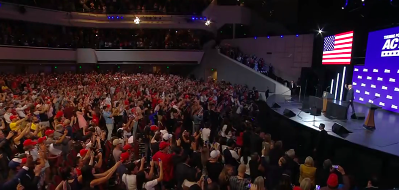 Image: Trump supporters packed the auditorium at Dream City Church on Tuesday, most not wearing masks, after church leaders claimed their new air-purification system would make the place safe from COVID-19.
