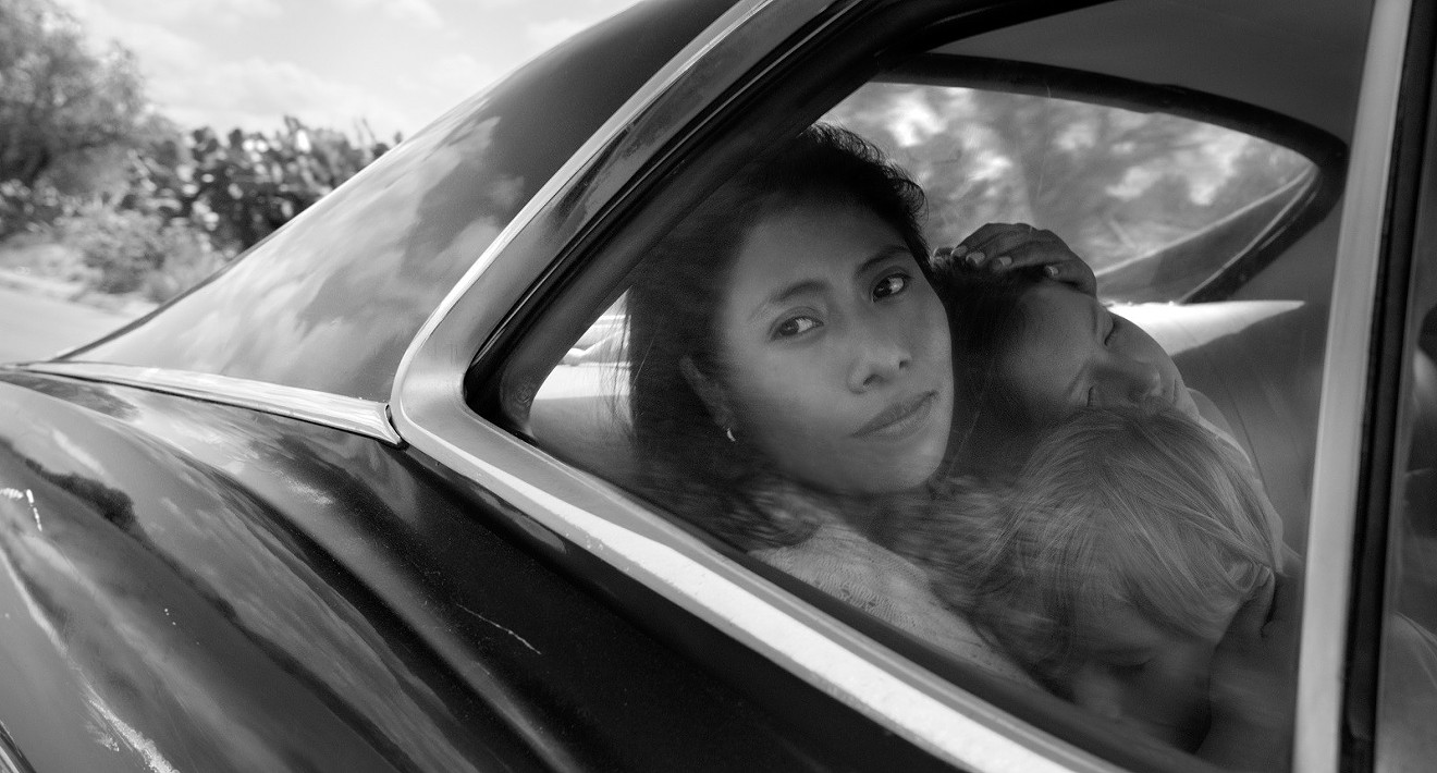 Yalitza Aparicio plays Cleo, the caretaker of a privileged family in the early ’70s who also becomes the soul sister and friend to matron of the home Sofia in Alfonso Cuarón’s autobiographical film Roma.