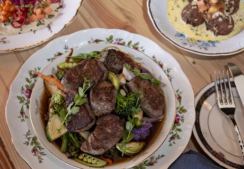 Image: Venison medallions cooked in a cast-iron skillet are among the stars at Cotton & Copper.
