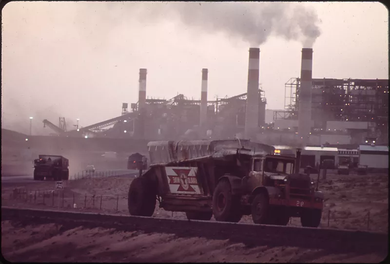 Image: Trucks carry coal from the Navajo Mine to the Four Corners Generating Station, which is mostly owned by Arizona Public Service, in New Mexico in 1973. Two units are still in use today.