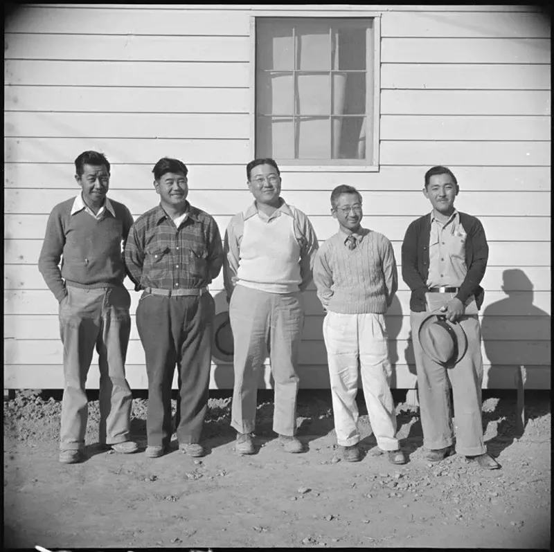 Image: Saburo Kido (far right), National President of the Japanese American Citizens League, a civil rights group, with other lawyers at Poston Camp Number 1 in Poston, Arizona, on Jan. 4, 1943.