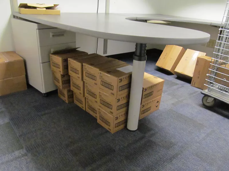 Image: Boxes of ammunition were found stored insecurely in a DES basement office in 2016. But a new audit report contradicts a state report last year that ammo purchases under former DES Director Tim Jeffries violated the law.