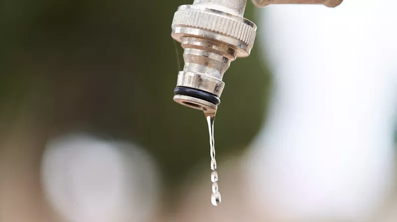 Image: a dripping faucet