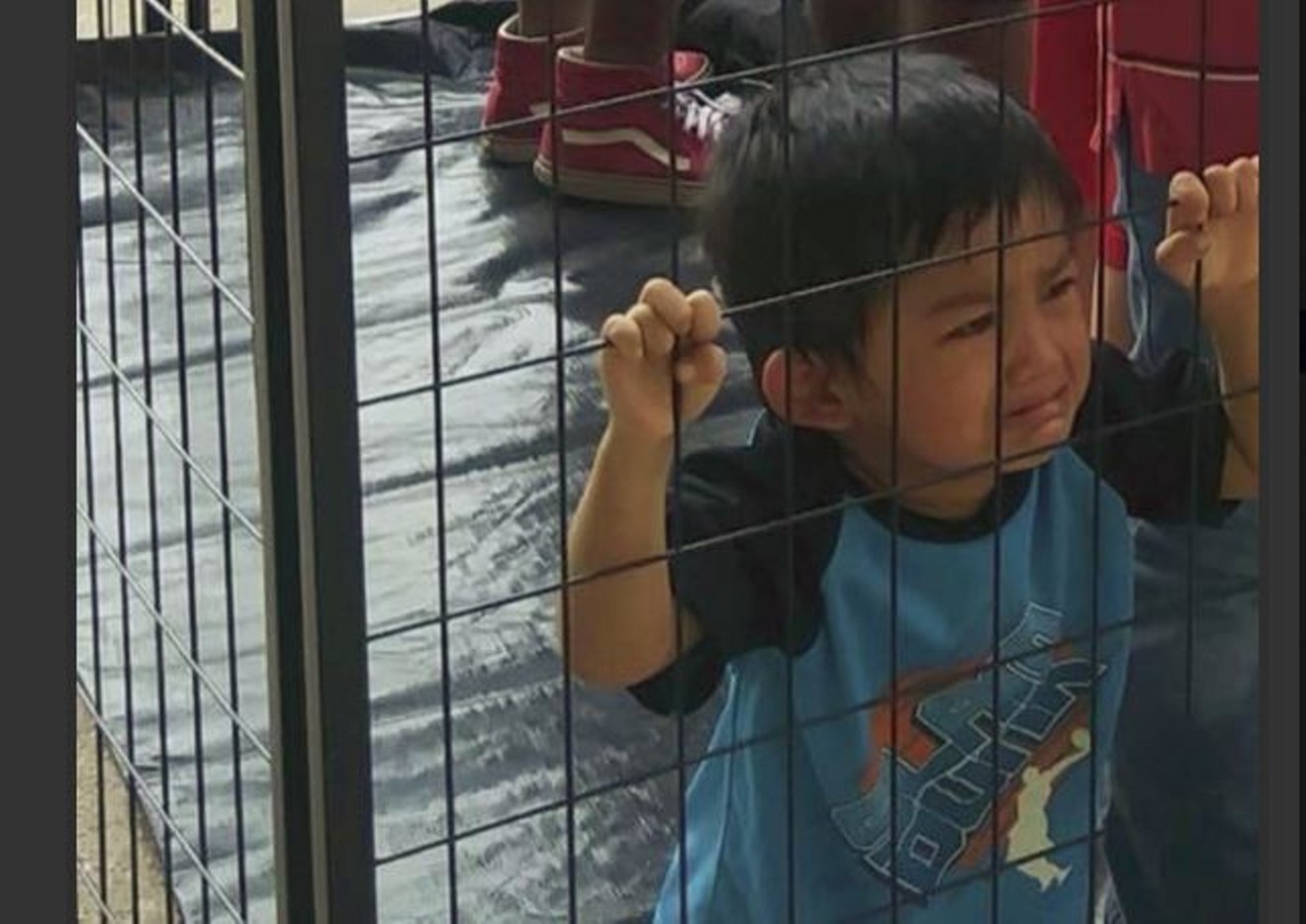 The Trump administration is detaining undocumented children after separating them from a parent — does it matter that this viral photo doesn't really show a migrant kid or a real jail?