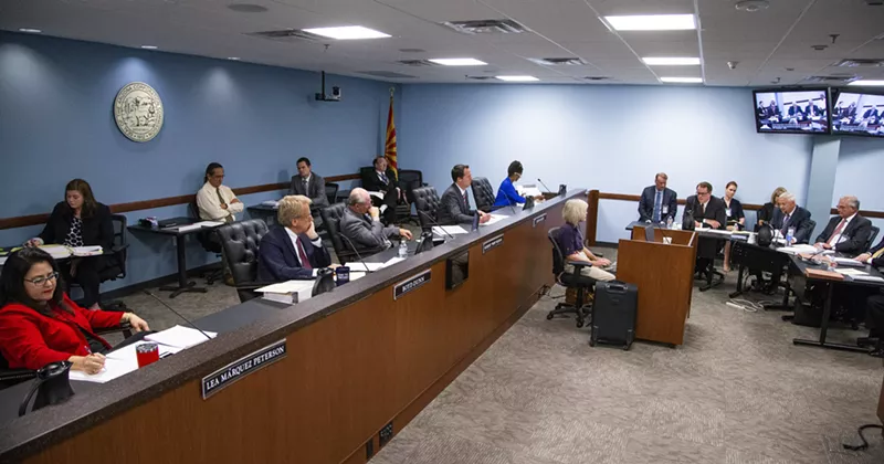 Image: Arizona Corporation Commissioners ask questions of Arizona Public Service executive Don Brandt in September.