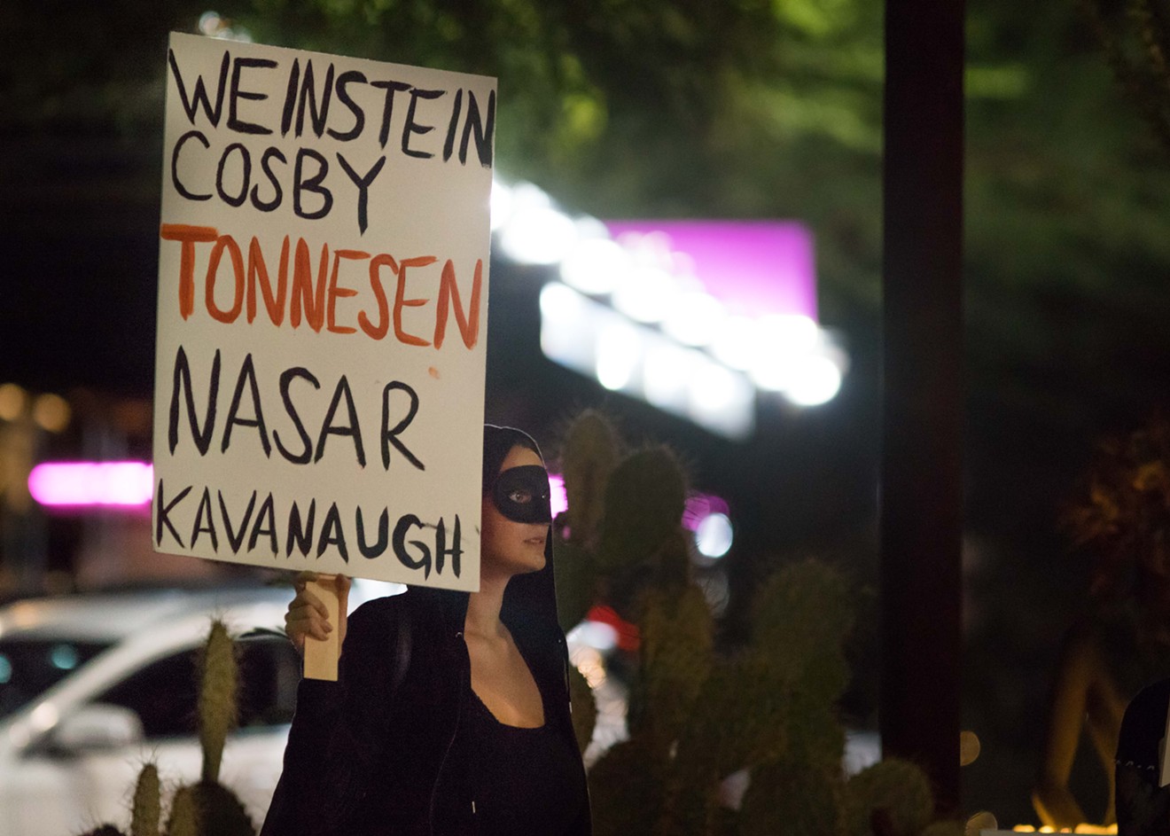Women protest outside the site of Tonnesen's former Lavatory museum, where many of his alleged acts of sexual misconduct occurred, on Nov. 4.