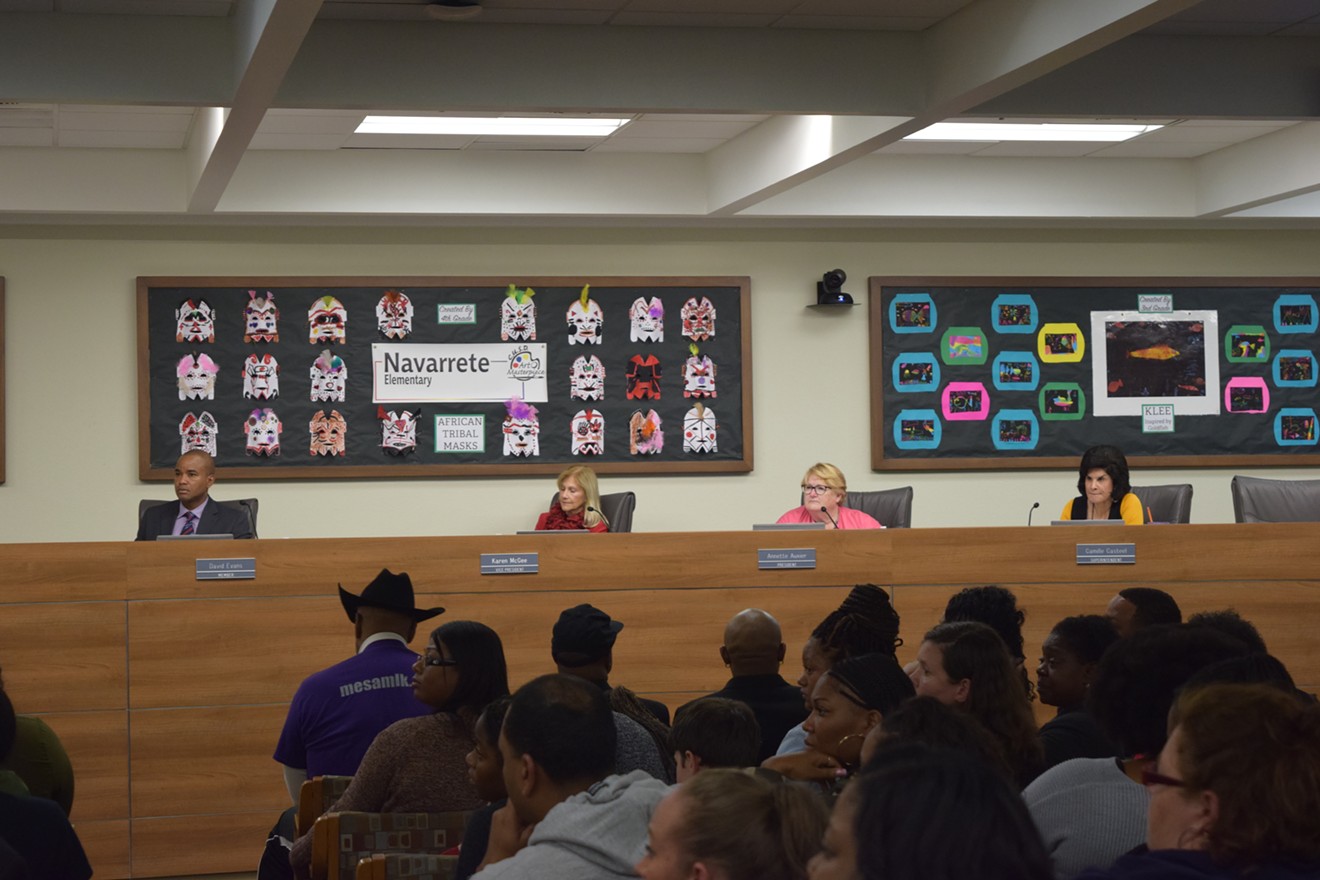 Chandler Unified School District President Annette Auxier, second from right, left early during a meeting in which African-American parents raised numerous concerns about the district's handling of a racist incident.