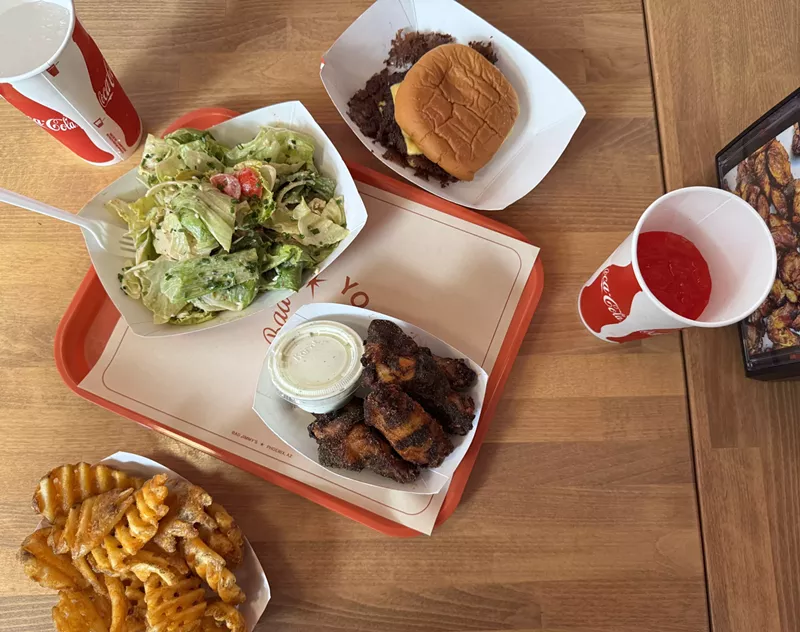 Image: Bad Jimmy's opened in uptown Phoenix on Thursday. The restaurant serves a taut menu that includes burgers, fries, salad and wings.