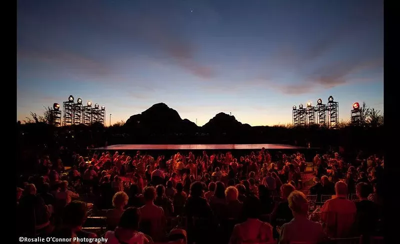 Image: The sun goes down as Ballet Arizona prepares to perform at Desert Botanical Garden.