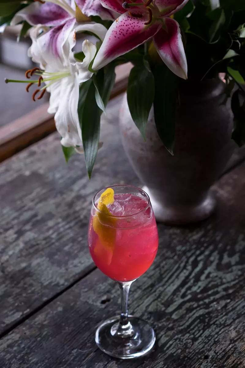 Image: The Andie Walsh cocktail, built with house-made hibiscus syrup, is named for the Pretty In Pink character played by Molly Ringwald.