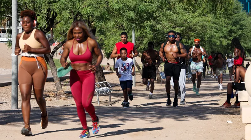 Image: Every Sunday at 7:30 a.m., people join the BLK Arizona Run Club at Tempe Town Lake seeking fitness and community.