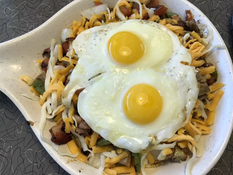 Image: The Arizona skillet from Mel's Diner, with eggs sunny-side up.