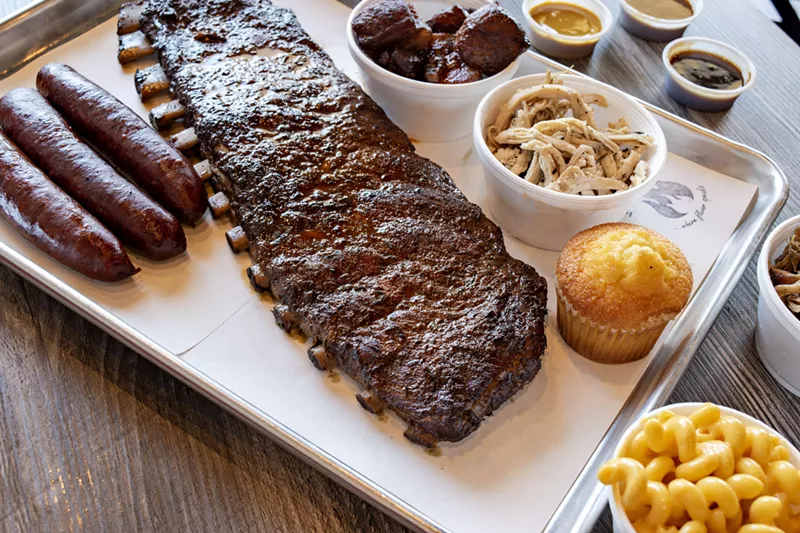 Image: Hotlinks, ribs, tips, turkey, and sides at Word of Mouth.