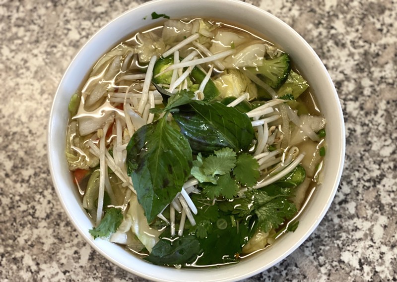 Pho with tofu, vegetables, and vegan broth comes out hot and fast.