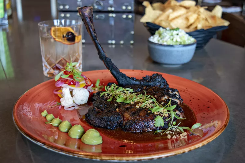 Image: A pork chop blackened.