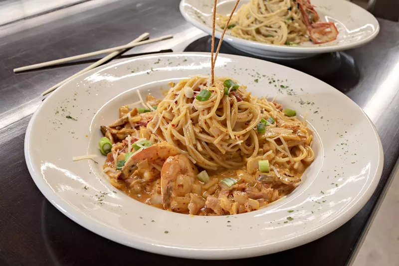 Image: Kimchi pasta and mentaiko pasta on deck at Katsu in Asiana Market.