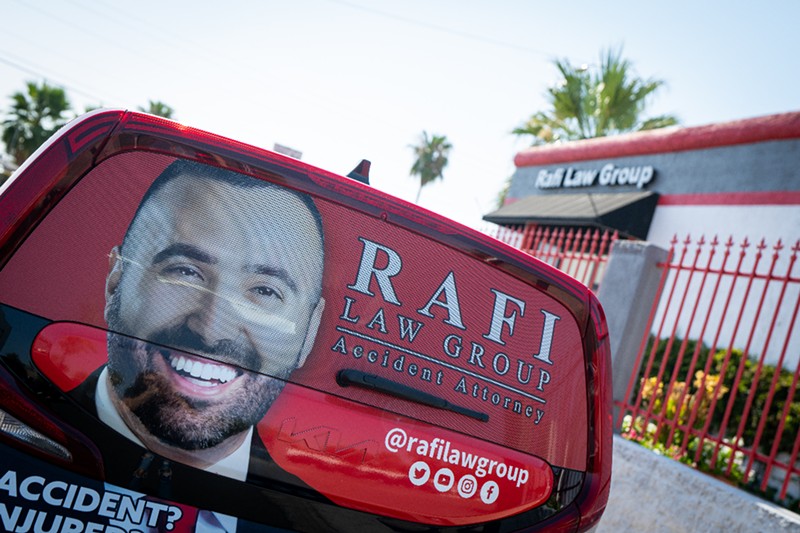 Brandon Rafi's face is all over Phoenix. In his lawsuit, he claims Gil Negrete has damaged his reputation.