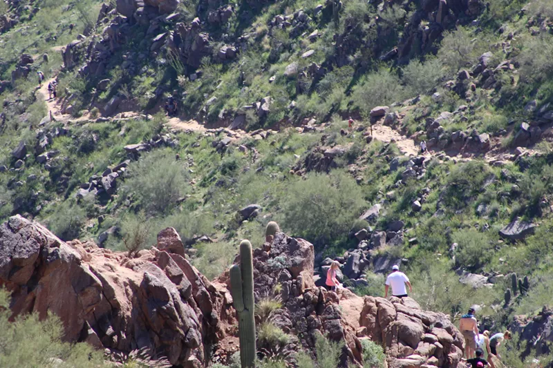 Image: Hikers on Camelback Mountain's rugged Cholla trail.