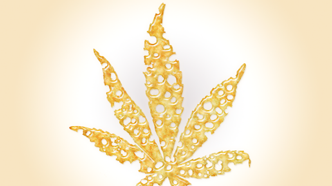 A marijuana flower made out of bronze oil
