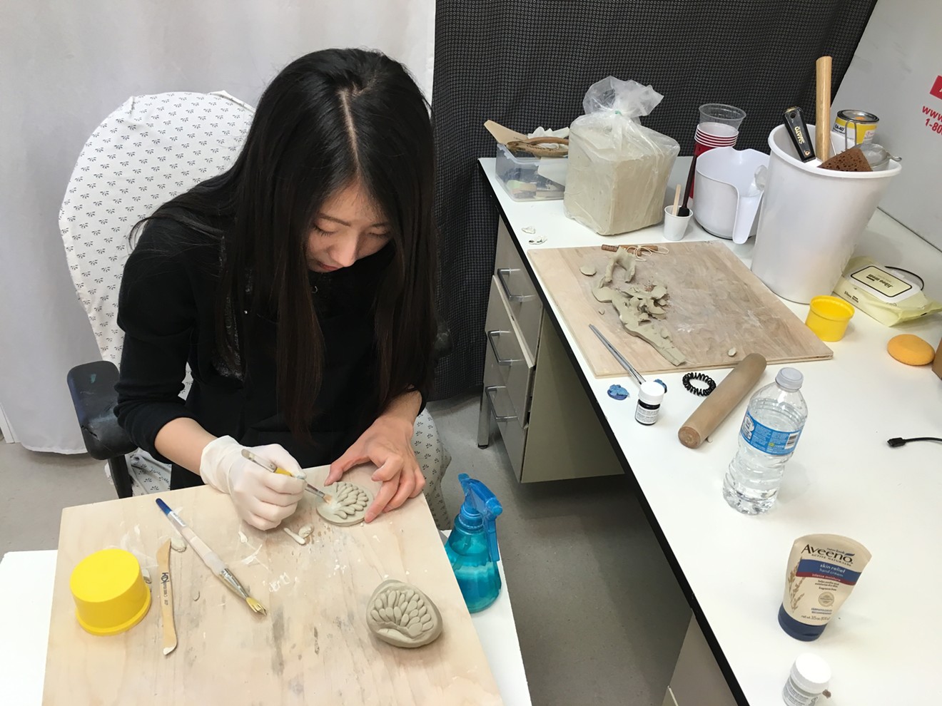 Hakyoung Kim doing a demonstration of her ceramics technique during the 2016 ASU Ceramic Studio Tour.