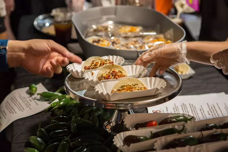 Image: Plating spicy bites at a past Chile Festival