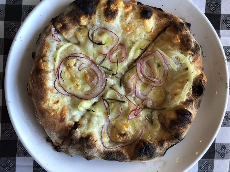 Image: Pizzetta with lemon, red onion, and rosemary, new at Pane Bianco Van Buren.