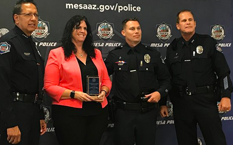 April Sponsel receives an award from Mesa police in 2018. Critics say she'll do anything to win a case.