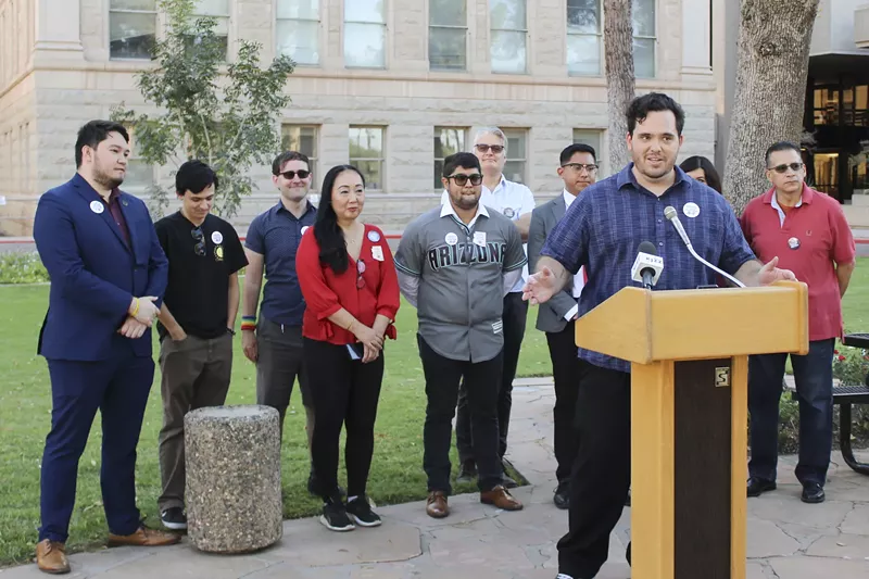 Image: Robert Nichols, campaign chair of Arizona Works Together, was joined by state legislators and others during a press conference on Oct. 25. The organization's proposed ballot initiative would strike “right-to-work” language from the state constitution.