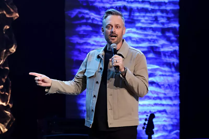 Image: Nate Bargatze speaks onstage for "A Country Thing Happened On The Way To Cure Parkinson's" benefitting The Michael J. Fox Foundation, at The Fisher Center for the Performing Arts on April 26, 2023, in Nashville.
