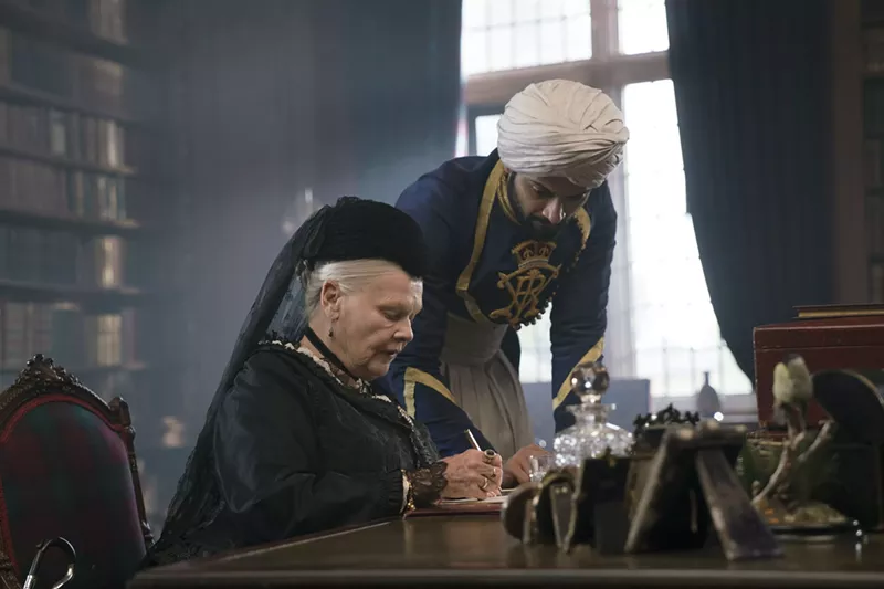 Image: In Victoria & Abdul, the spirited friendship between Queen Victoria (Judi Dench, left) and Abdul Karim (Ali Fazal), a charming clerk from northern India, is often played for laughs.