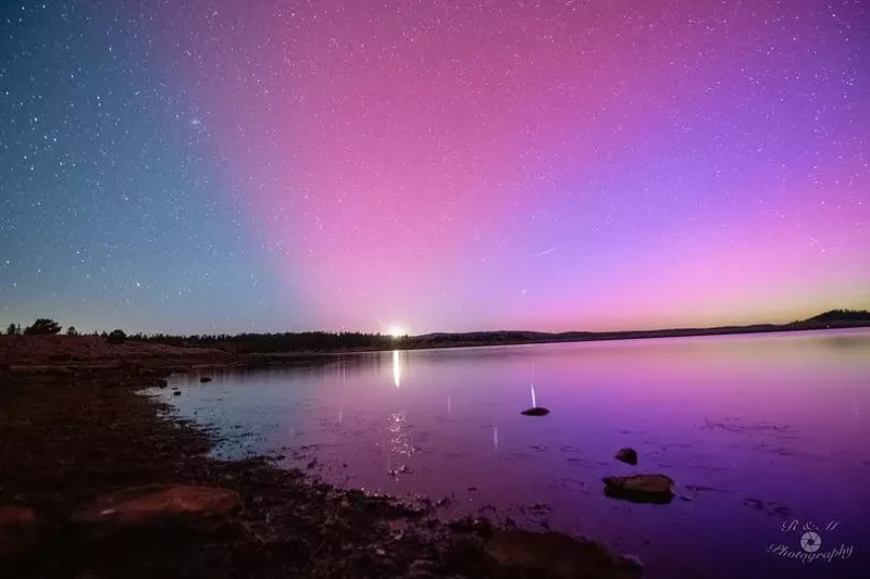 Image: A photo of the purple northern lights outside of Eagar in northeastern Arizona.
