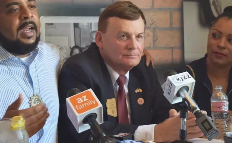 Image: David Stringer (center) faces more consequences at his legislature job following his most recent racist statements.